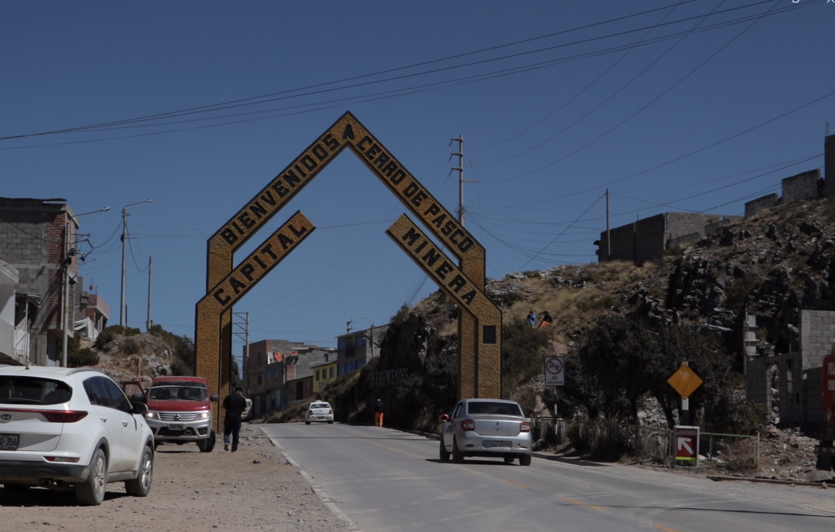 Roadside arch welcoming visitors to Cerro de Pasco, described as the mining capital
